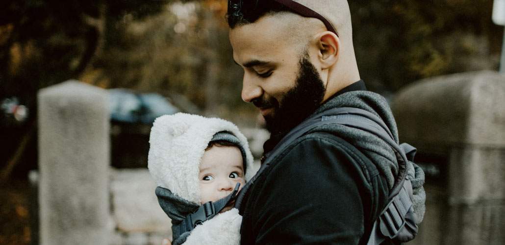 Dad holding baby